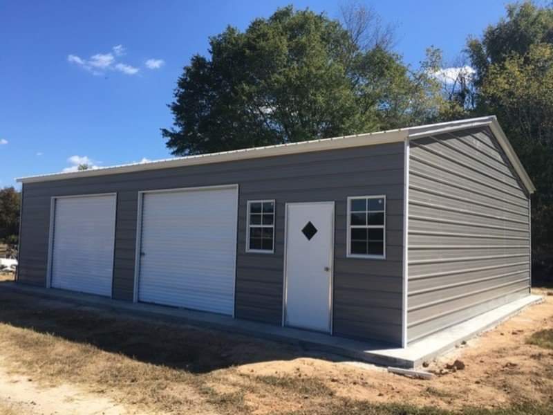 A garage with two doors and a window.